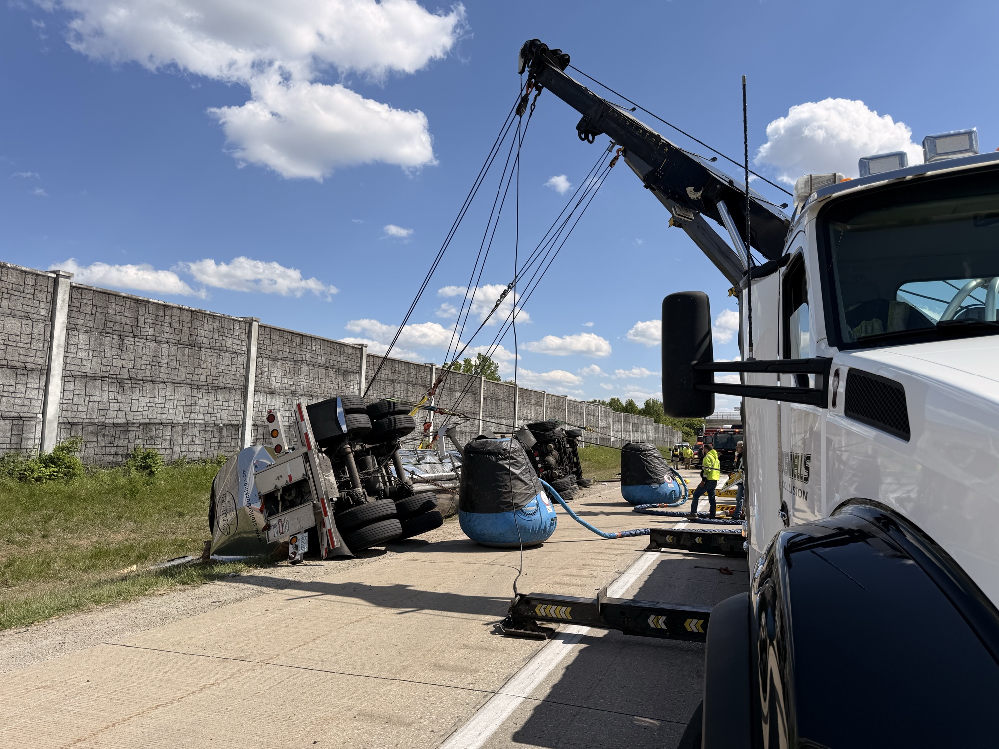Bushnell's heavy recovery truck lifting an overturned semi trailer